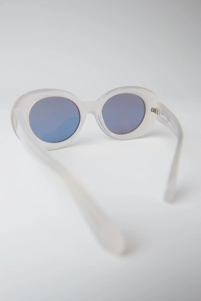 Shop Acne Studios Oval Sunglasses White Clear/blue