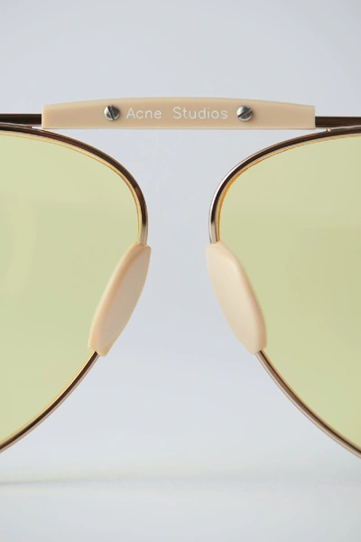 Shop Acne Studios Aviator Eyewear Pale Gold/yellow
