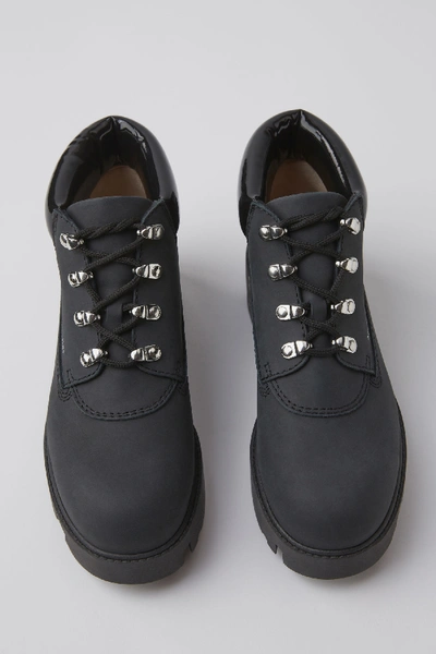 Shop Acne Studios Puffy Booties Black/black