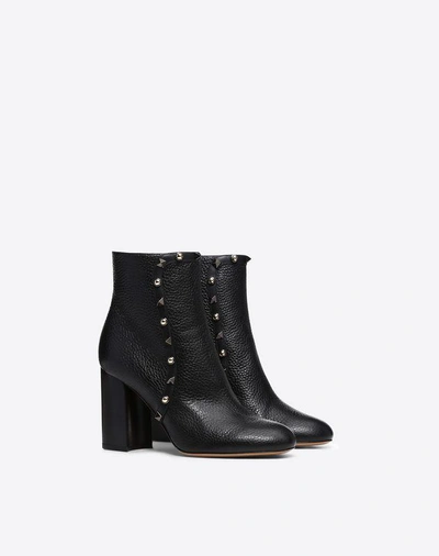 Shop Valentino Rockstud Rolling Bootie 90mm In Black