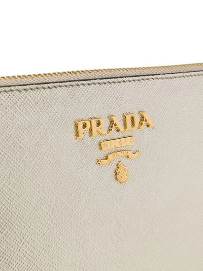 Shop Prada Logo Plaque Clutch Bag - Metallic
