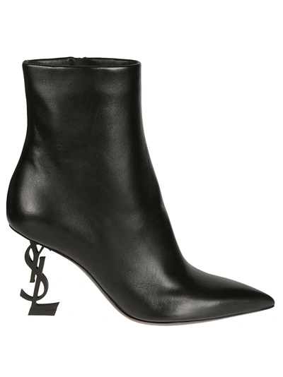 Shop Saint Laurent Opyum Ankle Boots In Black