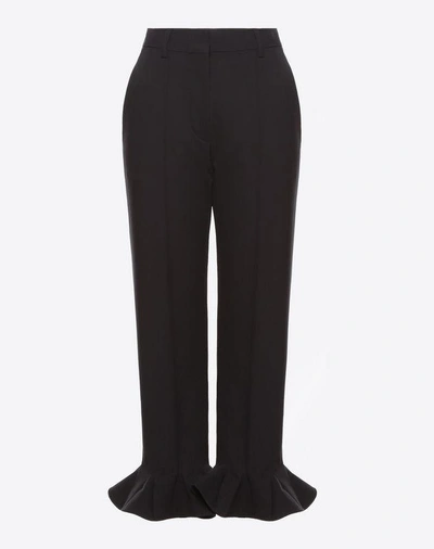 Shop Valentino Trousers In Stretch Wool In Black