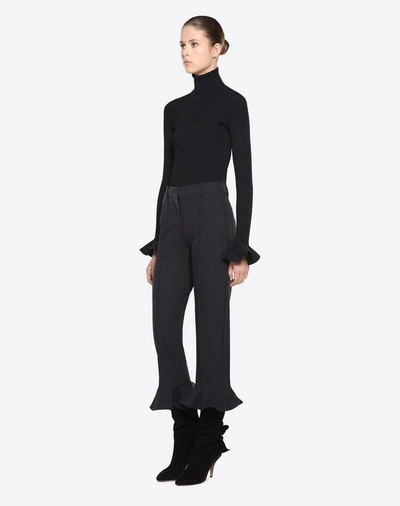 Shop Valentino Trousers In Stretch Wool In Black