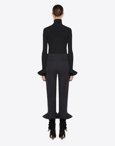 Shop Valentino Trousers In Stretch Wool In Black