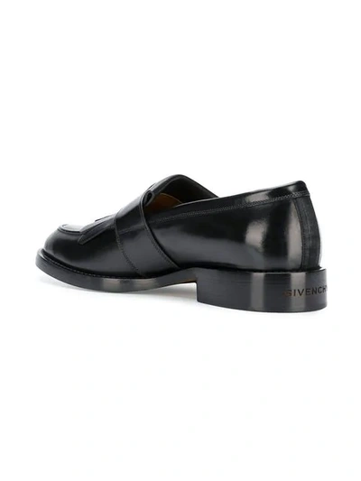 Shop Givenchy Buckled Fringe Loafers - Black
