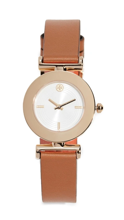 Shop Tory Burch The Sawyer Twist Round Watch In Ivory Gold/orange