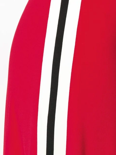 Shop Norma Kamali Side Stripe Jumpsuit - Red