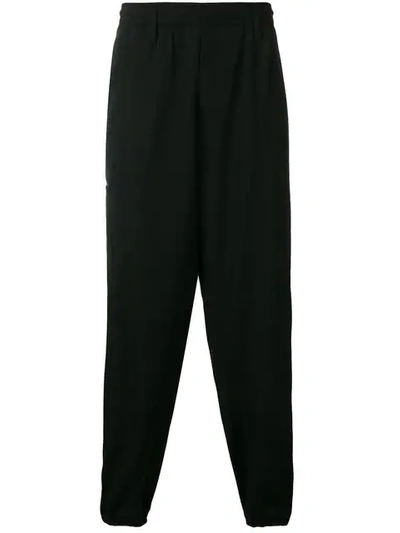 Shop Yohji Yamamoto Relaxed Trousers In Black