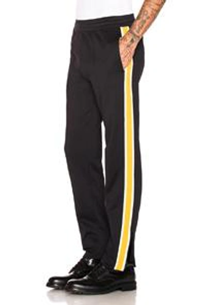 Shop Moncler Track Pants In Black