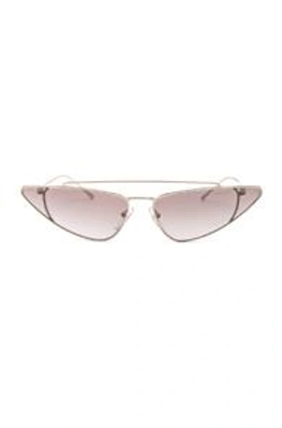 Shop Prada Low Angle Cut Sunglasses In Brown In Pale Gold & Gradient Brown Mirror