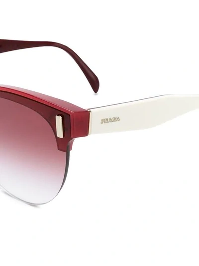 Shop Prada Eyewear Cat-eye Sunglasses - Red