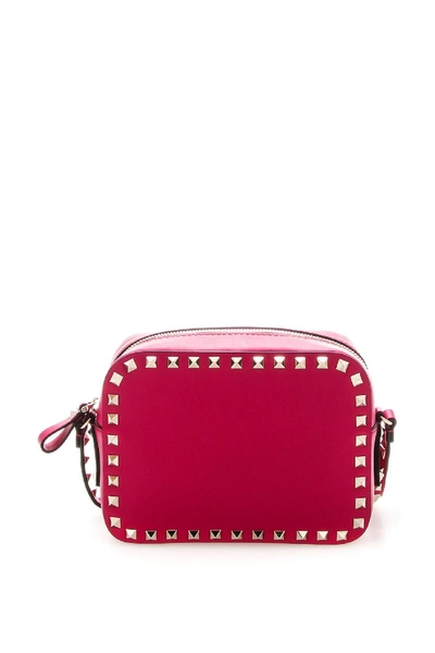 Shop Valentino Rockstud Crossbody Bag In Disco Rosa