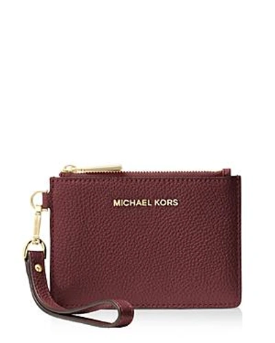 Shop Michael Michael Kors Small Leather Wristlet In Oxblood Red/gold