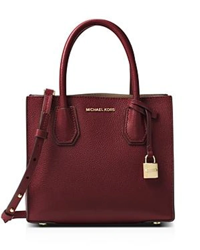 Shop Michael Michael Kors Mercer Medium Leather Messenger In Oxblood Red/gold