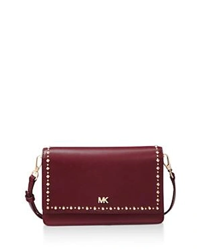 Shop Michael Michael Kors Phone Small Leather Crossbody In Oxblood Red/gold