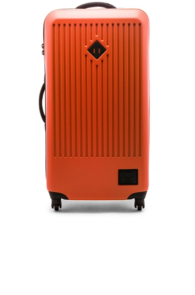 Shop Herschel Supply Co Trade Large Suitcase In Vermillion Orange