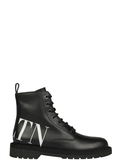 Shop Valentino Combat Boots In 0ni