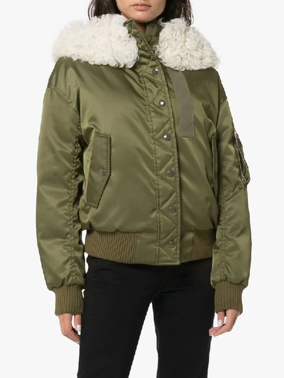 Shop Miu Miu High Neck Quilted Shearling Parka - Green