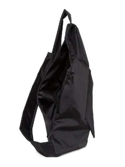 Shop Eastpak X Raf Simons 'sleek Sling' Crossbody Logo Embellished Bag - Black