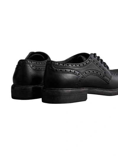 Shop Burberry Lace-up Brogue Detail Textured Leather Asymmetric Shoes - Black