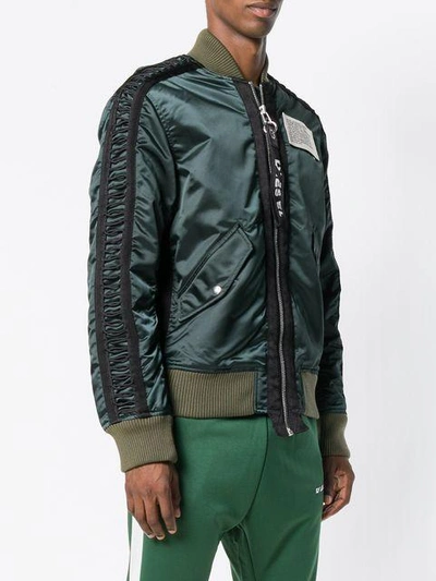 Shop Diesel Ribbed Sleeve Bomber In Green