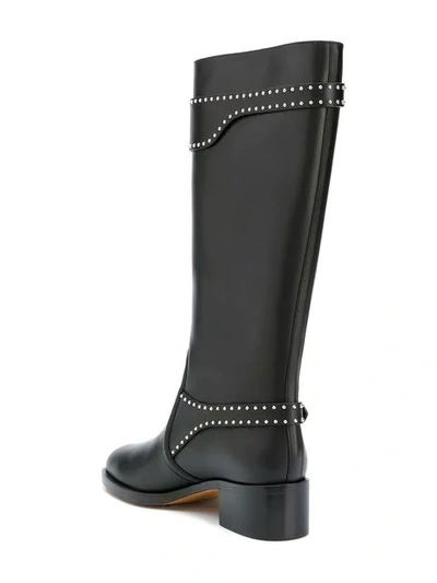 Shop Givenchy Studded Riding Boots In Black