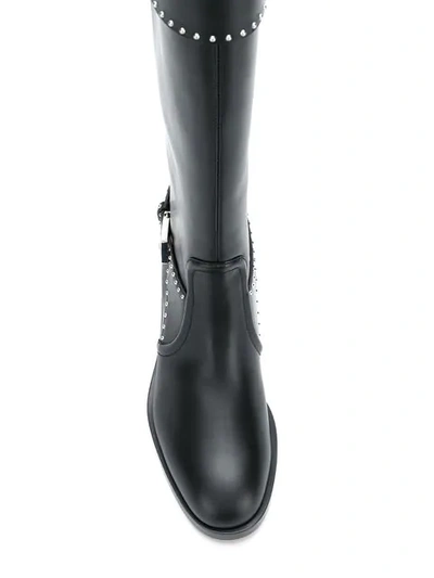 Shop Givenchy Studded Riding Boots In Black