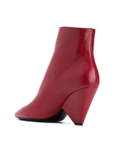 Shop Saint Laurent Niki 85 Asymmetric Boots In Red