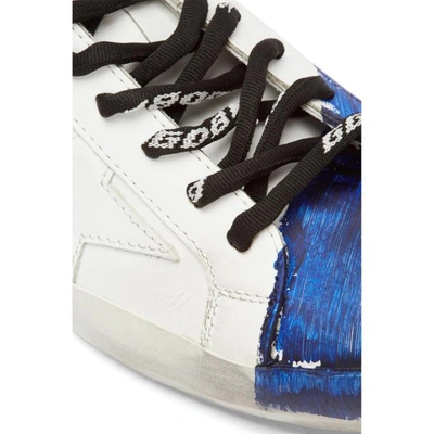 Shop Golden Goose White And Blue Stripe Superstar Sneakers In White-blue