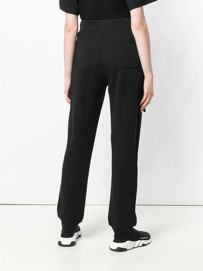 Shop Moschino Couture Wars Track Pants In Black