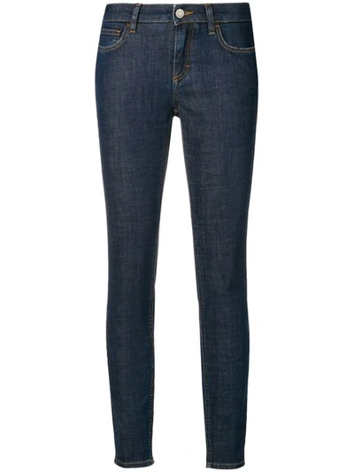 Shop Dolce & Gabbana Rear-slogan Skinny-fit Jeans In Blue