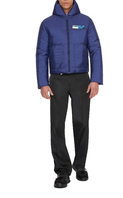 Shop Prada Hooded Logo Puffer Jacket In Blue