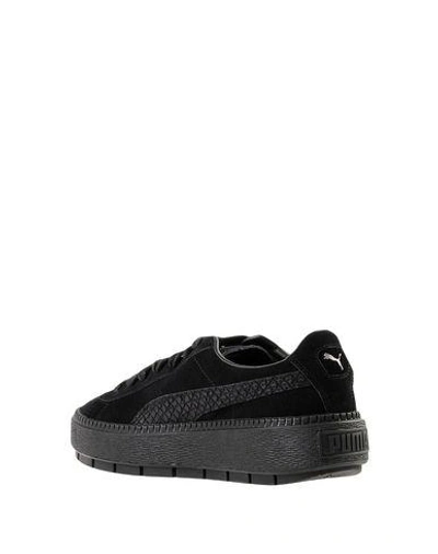 Shop Puma Sneakers In Black
