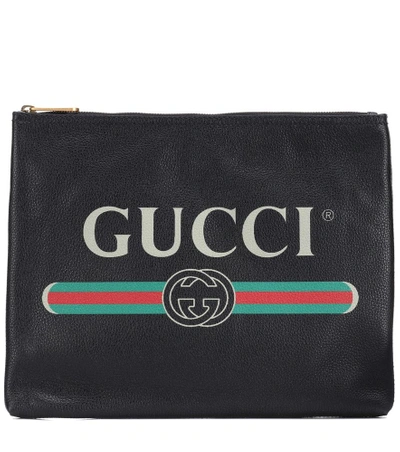 Shop Gucci Print Leather Pouch In Black