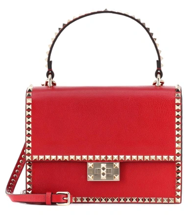 Shop Valentino Rockstud Shoulder Bag In Red