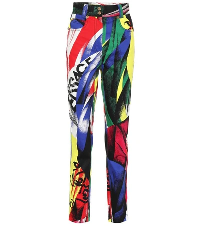 Shop Versace Printed High-waisted Jeans In Multicoloured