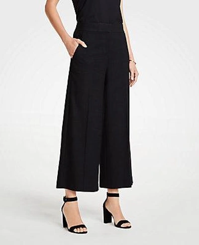 Shop Ann Taylor The Petite Houndstooth Wide Leg Marina Pant In Black