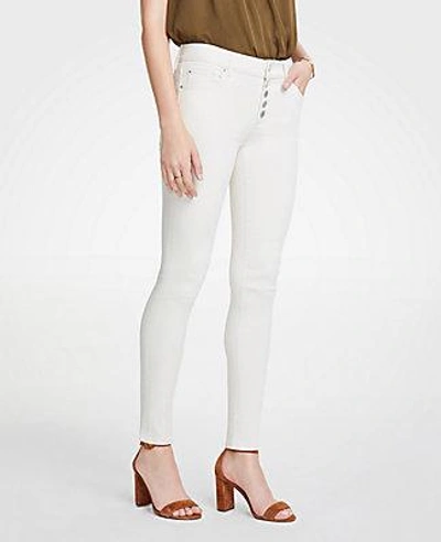 Shop Ann Taylor Petite Modern Button Fly All Day Skinny Jeans In Ecru