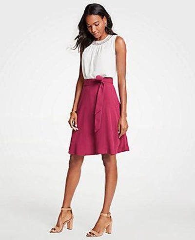 Shop Ann Taylor Petite Belted Flare Skirt In Frosted Cranberry