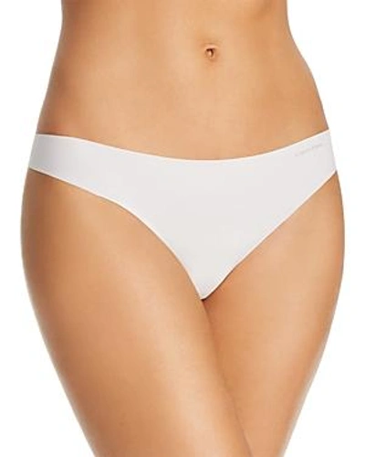 Shop Calvin Klein Invisibles Thong In Nymph's Thigh