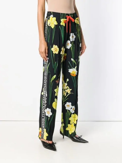 Shop Dolce & Gabbana Floral-print Jogger Trousers In Black