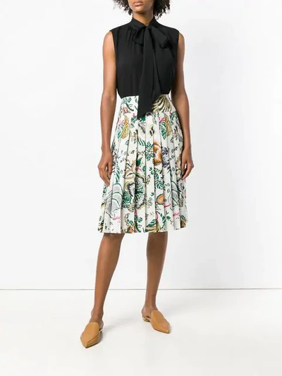 Shop Tory Burch Pleated Floral Print Skirt In White