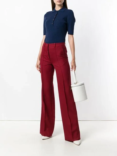 Shop Victoria Beckham Wide Pleated Trousers In Red