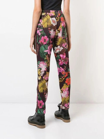 Shop Moncler Floral Print Trousers In Red