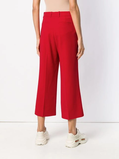 Shop Gucci Flared Cropped Trousers In Red