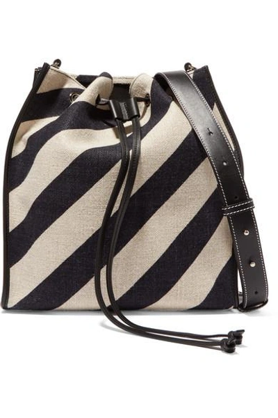 Shop Jw Anderson Leather-trimmed Striped Canvas Bucket Bag In Black