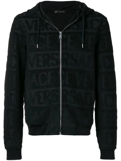 Shop Versace All Over Logo Hoodie In Black