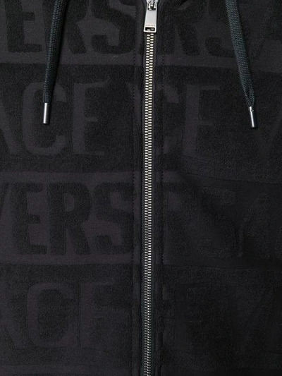 Shop Versace All Over Logo Hoodie In Black