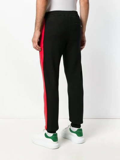 Shop Alexander Mcqueen Side Panel Track Pants - Black